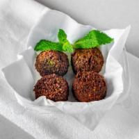 Falafel · our famous Falafel is made from scratch daily with premium chickpeas and fresh herbs and spi...
