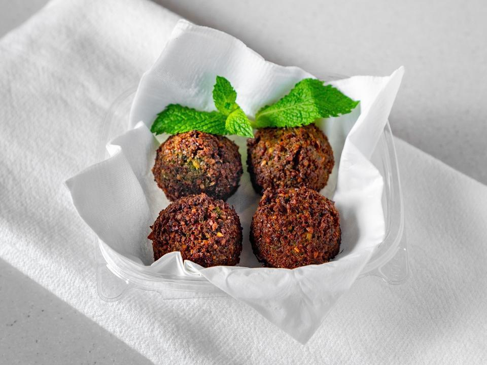 Falafel · our famous Falafel is made from scratch daily with premium chickpeas and fresh herbs and spices.  Those falafels are crispy from outside, moist from inside, and bursting with flavors. Try them with our delicious sauces.