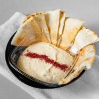 Eggplant Mutabal W/ Pita Bread · A smoky Middle Eastern dip made with grilled eggplant and olive oil. Our mutable has a spicy...