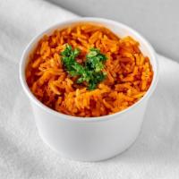 Rice Bowl · Basmati rice that has been cooked in a tomato-based sauce.