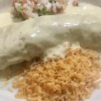 Burrito Loco · chorizo (mexican sausage), grilled steak and grilled chicken sauted with onions, served, wit...