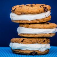 Ice Cream Sandwich · 2 of our chocolate chip cookies baked in house with vanilla ice cream