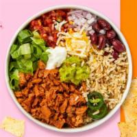 Champecano Mood Bowl · A blend of different meats topped with sour cream, salsa, jalapeno, lettuce, sweet corn, oni...