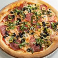 Tommy Mulligan · Topped with red onions, black olives, salami, green olives, and basil
