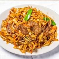 Drunken Noodles With Vegetables · Sautéed broccoli, green pepper, pea pods, and mushroom with thick rice noodles in a special ...