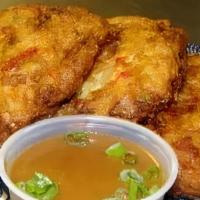 Roasted Pork Egg Foo Young · With rice. Sauce on the side.