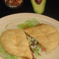 Tortas · Filled with beans, melted cheese, sour cream, lettuce, tomato and avocado