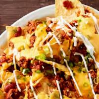 Cheese Nachos · Chips with cheese and a variety of toppings.