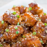 Sesame Chicken 之嘛鸡 · Hot & Spicy. Hot! crispy chunks of chicken w. chef's special sauce on broccoli bed top w. se...