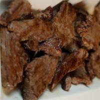Beef Tips · Perfectly seasoned tenderloin, zip sauce and garlic toast.