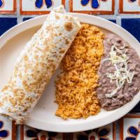 King Burrito Dinner · King burrito of your choice
served with rice and beans.