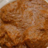 Beans Torborgee · Ingredients: Beans torborgee cooked with spices, beef, chicken, smoked turkey and served wit...