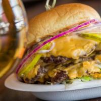 Le Big Mac · Mack sauce, two Jon's naturals wagyu patty’s, American cheese, shredded lettuce, pickle, red...