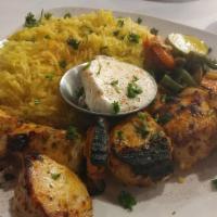 Chicken Tawook Platter · Marinated charcoal roasted chicken kebab seasoned with our special spice blend