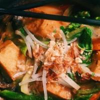 Hot & Sour Soup · Vietnamese hot and sour soup with water chestnuts, mushrooms, steamed tofu.  Garnished with ...