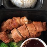 Sesame Chicken (Ga Xao Me) · Battered chicken glazed with sweet brown sauce and  steamed broccoli. Topped with sesame see...