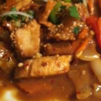 Saigon Curry (Xao Cari) · Sautéed bell peppers, carrots, fried potatoes  and onions in curry sauce. Topped with peanuts.