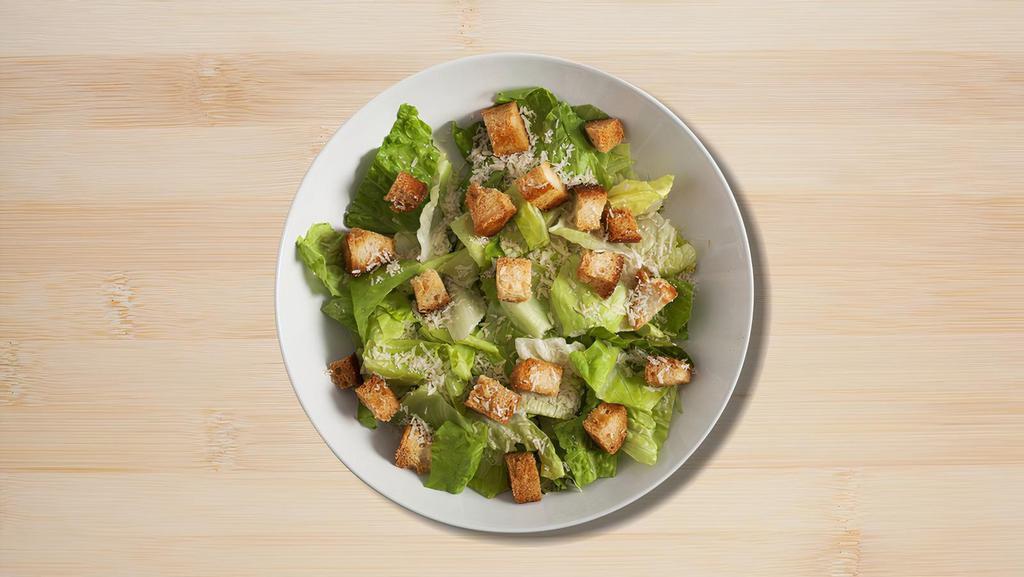 Crystal Salad · Fresh crisp romaine lettuce, tossed with Caesars dressing and topped with parmigiano reggiano and croutons