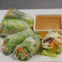 Spring Rolls · Gluten-free. Fresh, soft spring rolls stuffed with carrots, cucumbers, lettuce, rice noodles...