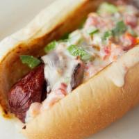 B&C Dog · All beef black angus hot dog from 44 farms, wrapped in jalapeno bacon, deep fried, topped wi...