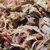 Pulled Pork Dinner · One half pound of our slow smoked, hand pulled pork shoulder.