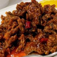Orange Beef / 橙皮牛 · Hot & Spicy.  Deep-fry. Fried breaded flank steak, dried chili in spicy and sweet sauce.