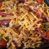 Bbq Chicken Salad · Romaine lettuce, corn, black beans, cherry tomatoes, pickled red onions, shredded cheese, se...