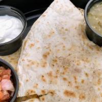 Quesadilla · Three cheese baked with sauteed, onions, and green peppers served with a side of salsa, sour...