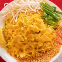 Pad Thai · Traditional rice noodles sauteed with eggs, green onions, bean sprouts and topped with peanu...