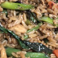 Basil Fried Rice · Fried rice with egg, basil, string beans, peas, carrots, and green onion.