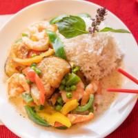 Keaw Warn (Mild) · Sauteed with thai green curry, green peas, bell peppers, eggplant and coconut milk.