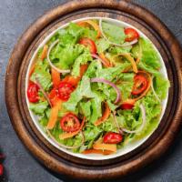 Garden Salad · Fresh green lettuce mix, tomatoes, black olives, red onions, bell peppers, and shredded mozz...