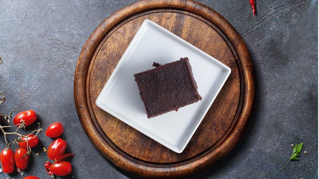 Chocolate Cake · Rich round chocolate ganache fudge cake.