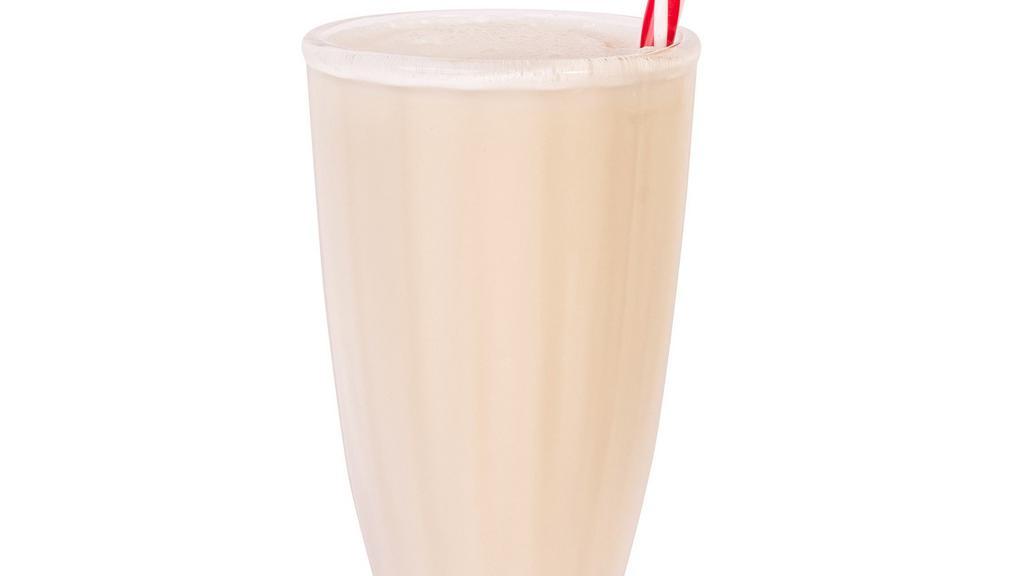 Vanilla Milkshake · Two hearty scoops of vanilla ice cream and milk, blended to delicious perfection