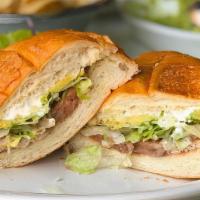 Torta · Includes beans, cheese, lettuce, tomatoes and sour cream.
