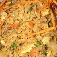 Fried Rice · Sautéed meat with steamed rice, egg, onion, green pea, and carrots.