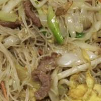 #48. Beef Chow Mei Fun · Skinny rice noodles stir fry with beef onion bean sprouts bok choy and eggs in delicious fla...