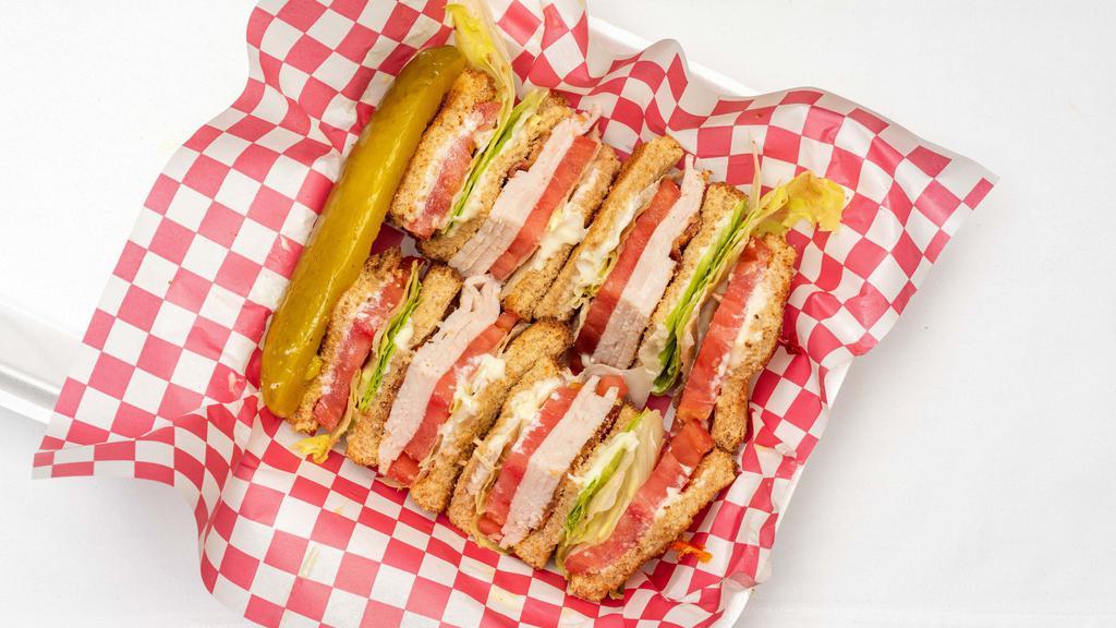 Club Sandwich · Turkey, bacon, lettuce, tomato and mayo.