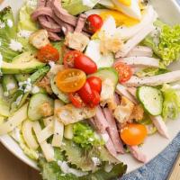 Chef Salad · Lettuce, smoked turkey, honey ham, American cheese, Swiss cheese, tomato, egg, and cucumber ...