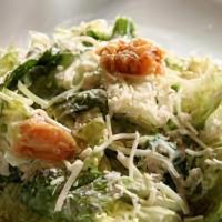 Caesar Salad · Lettuce, shaved Parmesan, croutons and Caesar dressing.