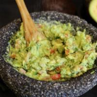 Guacamole · Hot. Fresh Hass avocado with onion, tomato, cilantro, and fresh lime juice.