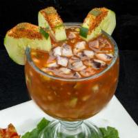 Coctel De Pulpo · Octopus with chopped cilantro, onions, tomatoes and avocado. Mixed in our homemade cocktail ...