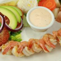 Camarones A La Plancha · Grilled butterfly shrimp. Served with steamed vegetables, white rice, slices of avocado, let...