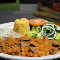 Bistec Ranchero · Succulent pieces of ribeye steak stewed with our ranchero sauce. Served with Mexican rice, r...