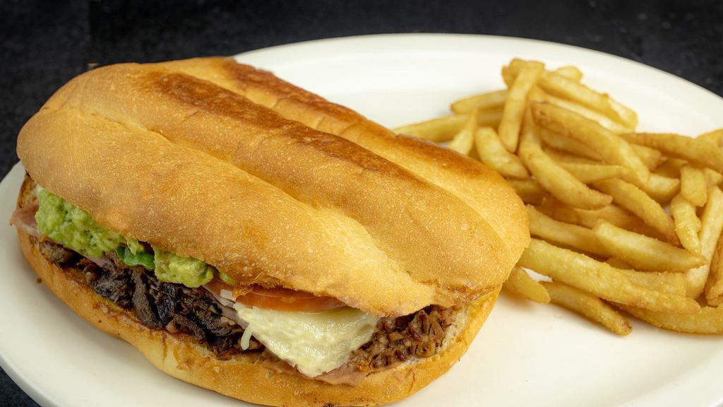 Torta Con Papas · Mexican sandwich with fries.