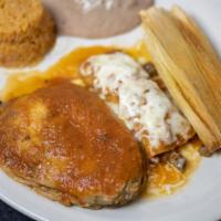 Combinacion 2 · One tamal, one enchilada, one stuffed pepper. Served with Mexican rice and refried beans.