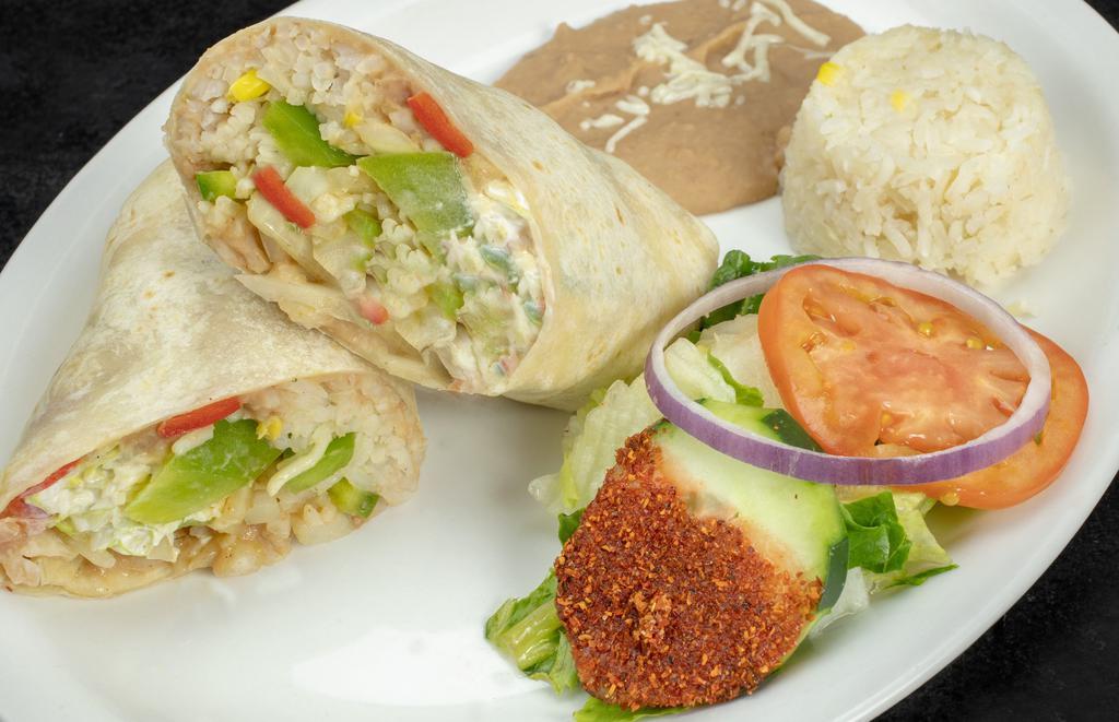 Veggie Deluxe Burrito · Burrito filled with sautéed bell peppers, onions, cheese, lettuce, tomato, slices of avocado and sour cream. Served with refried bean and white rice.