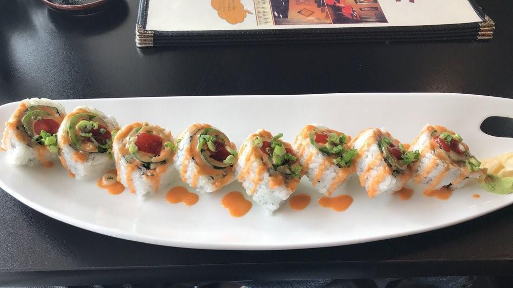 Jalapeno Roll · Gluten-free. Jalapeno, cream cheese, avocado, and cucumber topped with spicy sauce, jalapeno, sriracha sauce, and scallion.