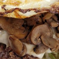 Loaded Mushroom Cheeseburger · double cheeseburger yellow American cheese grilled onion, grilled mushroom, fried egg on a g...