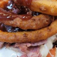 The Western Burger · Double cheeseburger, American cheese, topped with homemade corned beef, onion ring, BBQ sous...